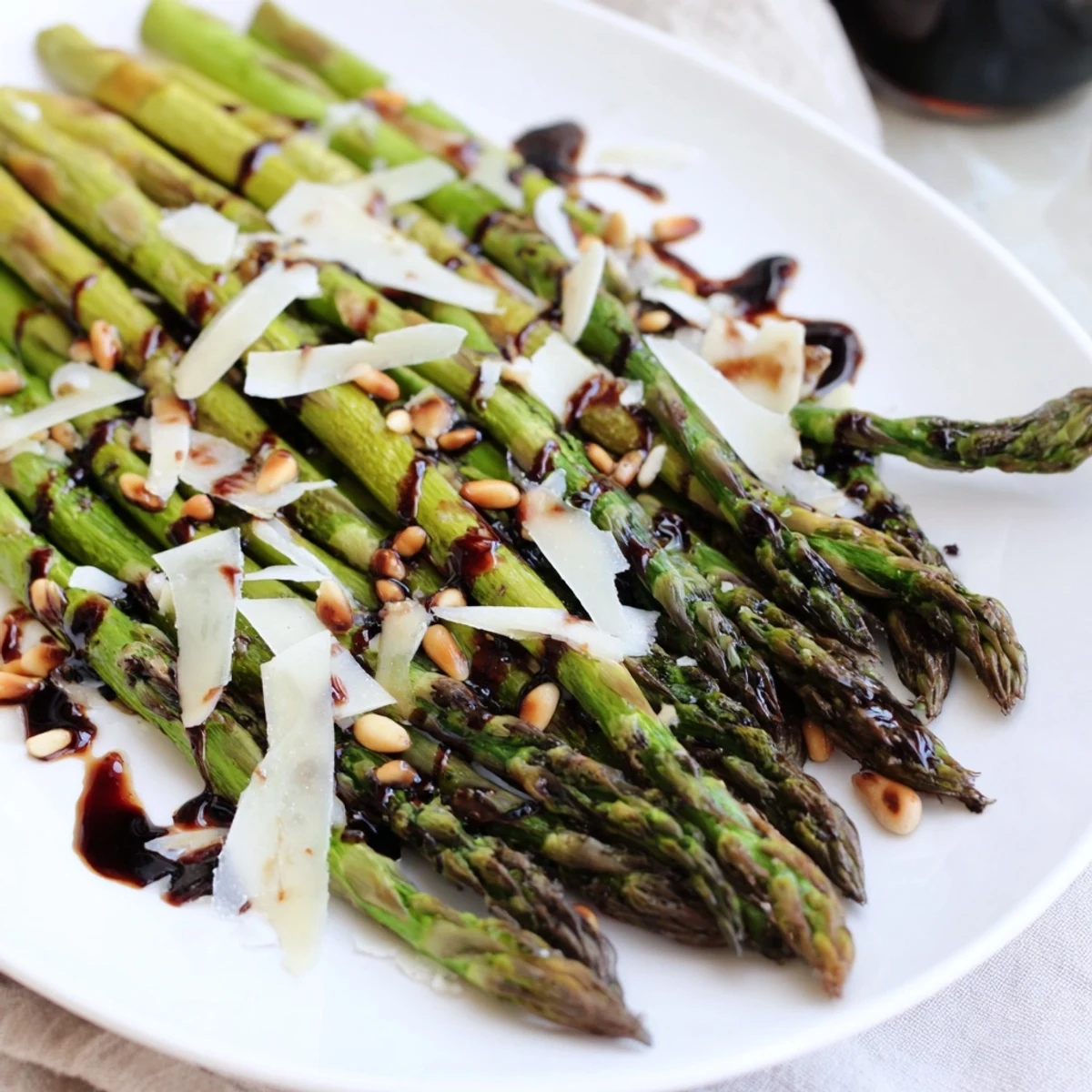 Perfectly roasted asparagus with Balsamic Glaze paired with grilled chicken for a delicious gluten-free dinner side.