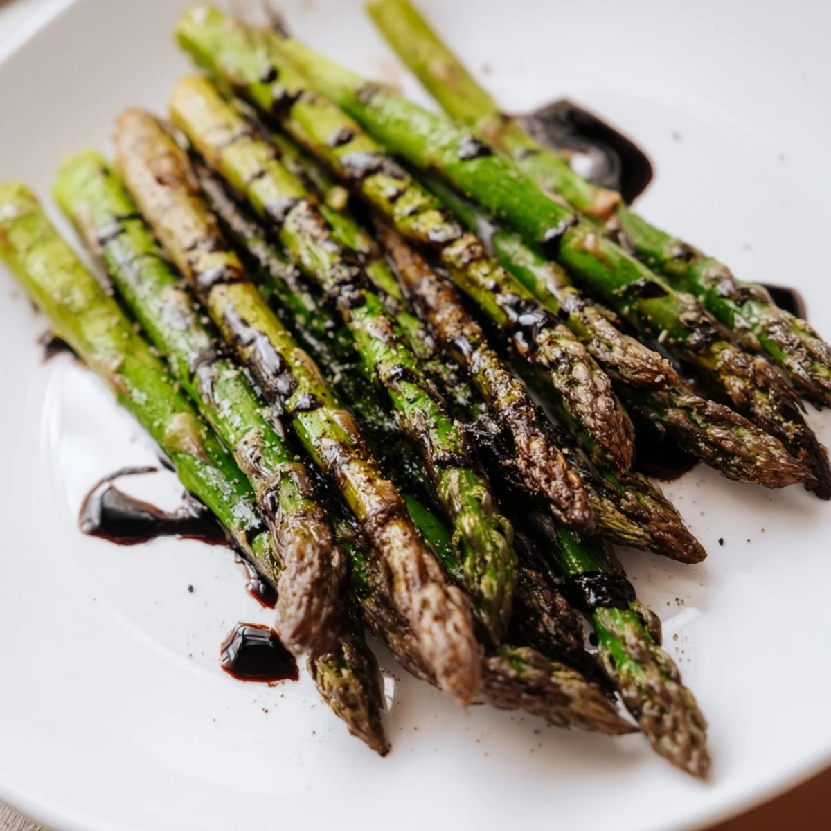 Tender roasted asparagus with balsamic reduction shines as an easy American side dish.