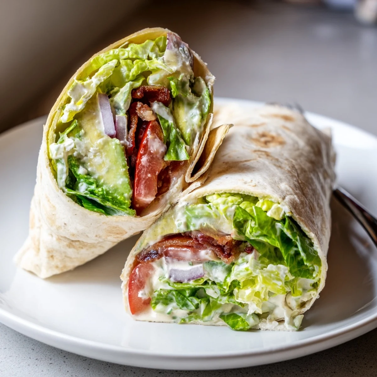 Meal Prep BLT Wraps with crispy bacon, juicy tomato, and creamy dressing